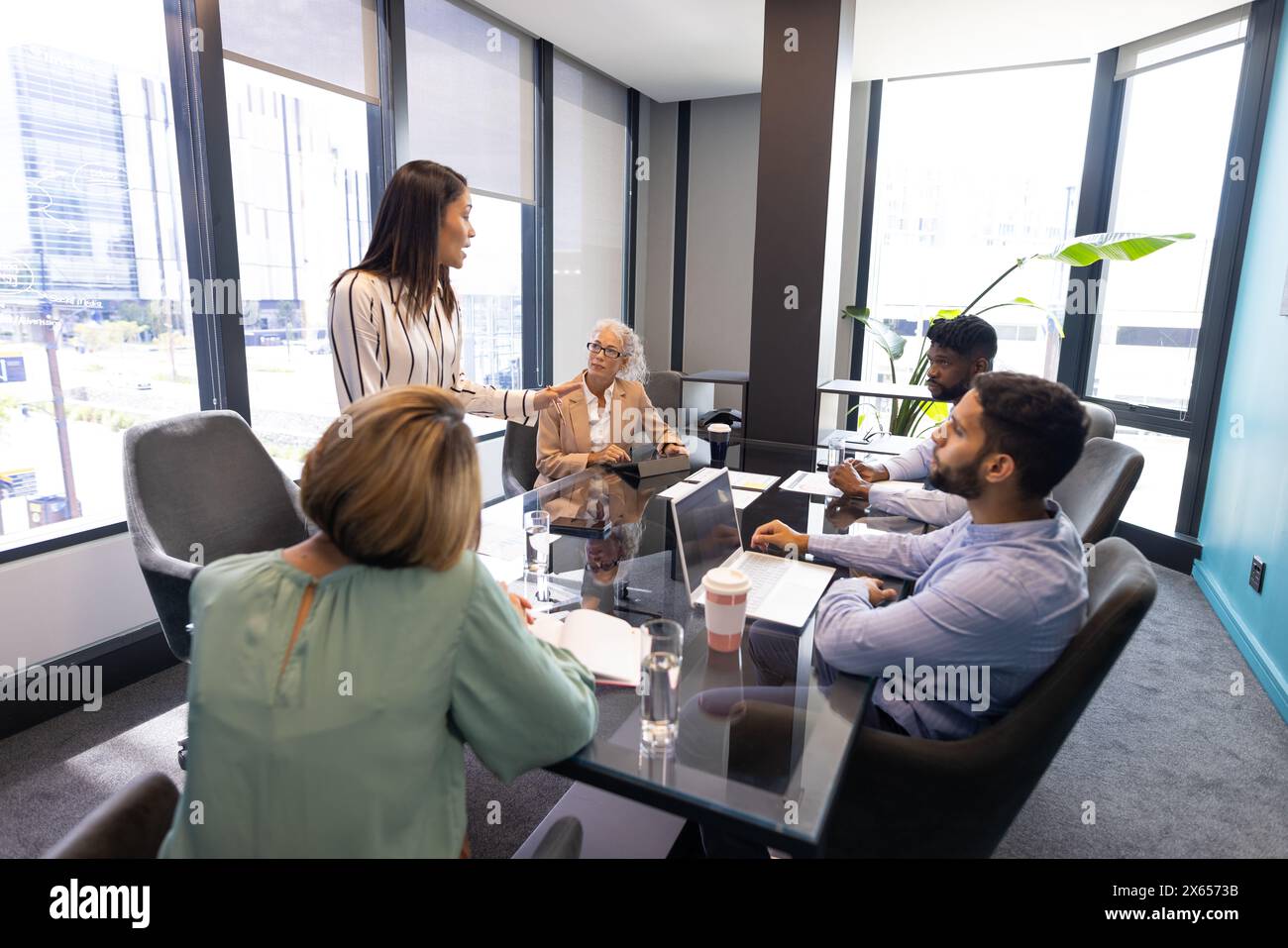 A diverse team is having meeting in a modern office Stock Photo