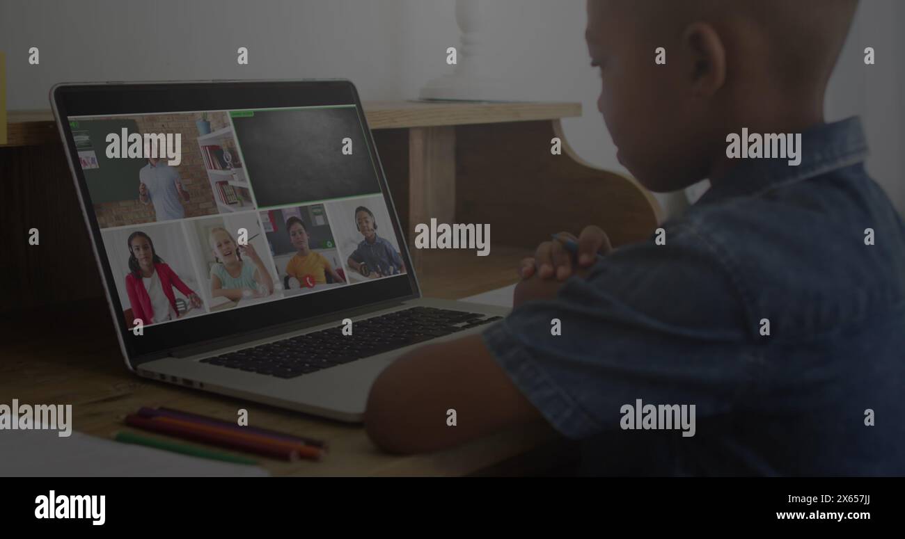 Image of graphs and binary code over african american boy having online ...