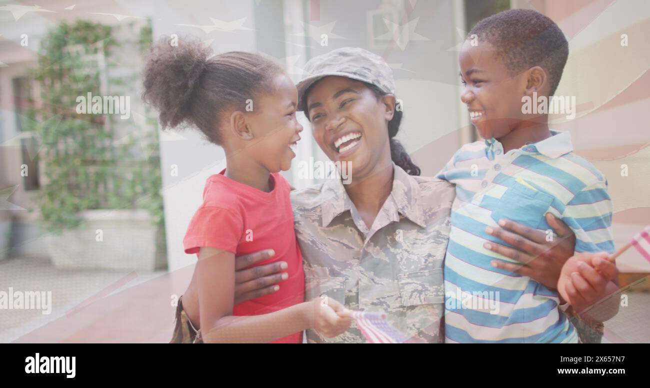 Image of flag of usa over african american female soldier with her children Stock Photo