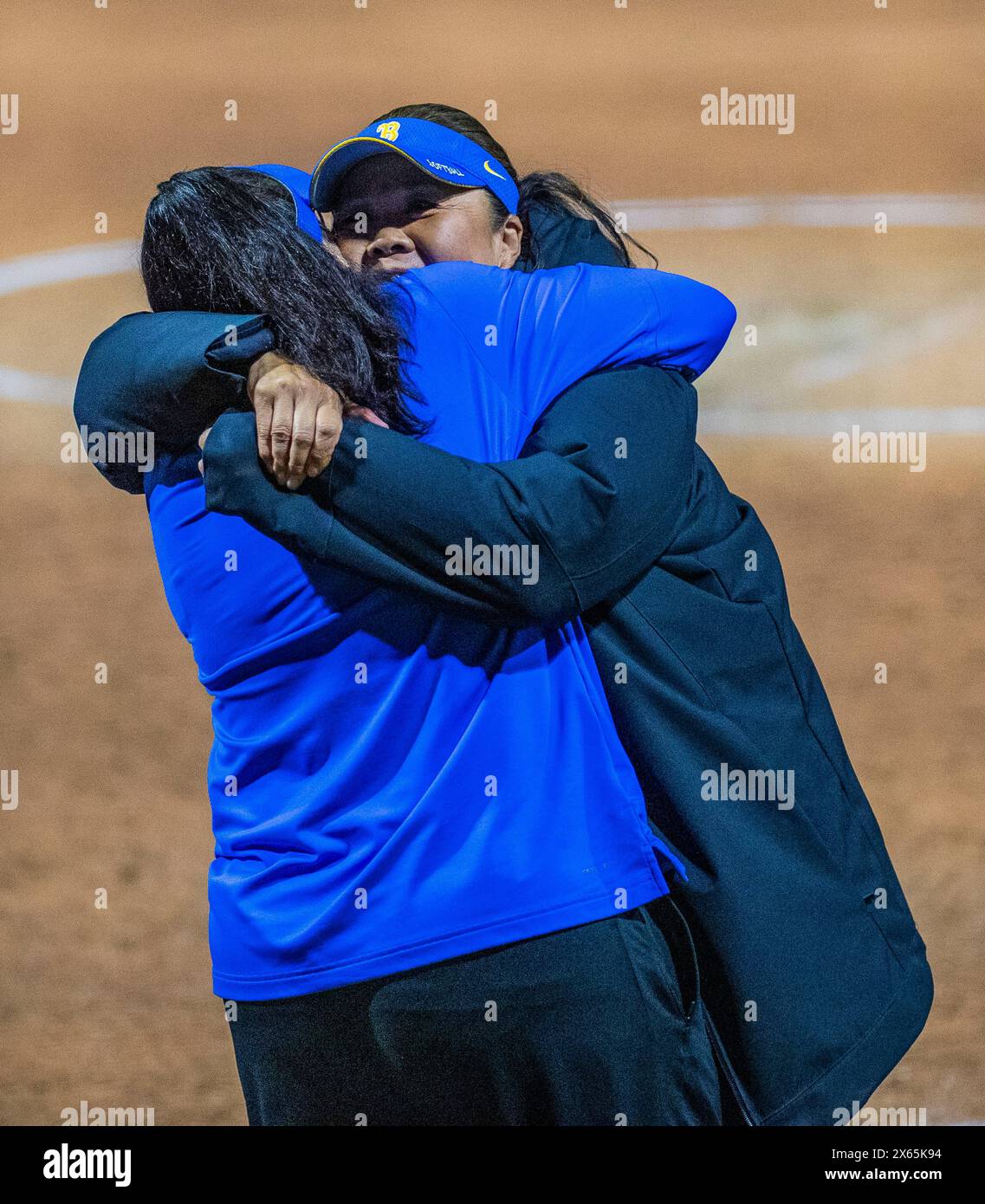 May 11 2024 Palo Alto CA U.S.A. Head Coach Kelly Inouye-Perez and Associate Head Coach Lisa Fernandez celebrate a win over Utah after the NCAA Pac 12 Softball Tournament Championship between UCLA Bruins and the Utah Utes. UCLA beat Utah 2-1 at Boyd & Jill Smith Family Stadium Palo Alto Calif. Thurman James/CSM Stock Photo