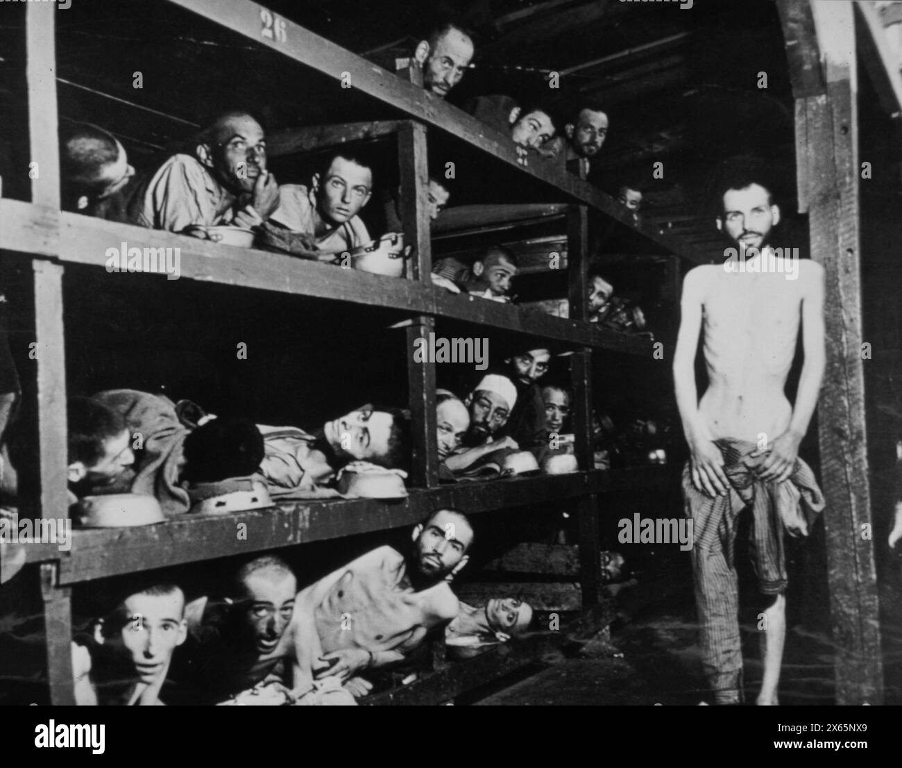 Prisoners of the Nazis concentration camps in their bunks at Dachau, Germany 1940s Stock Photo