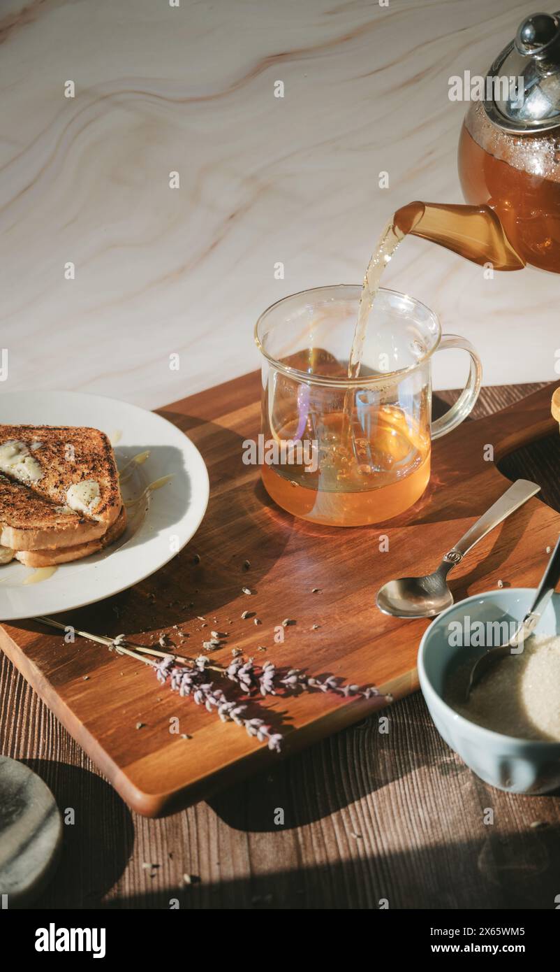 Pour tea and toast breakfast Stock Photo