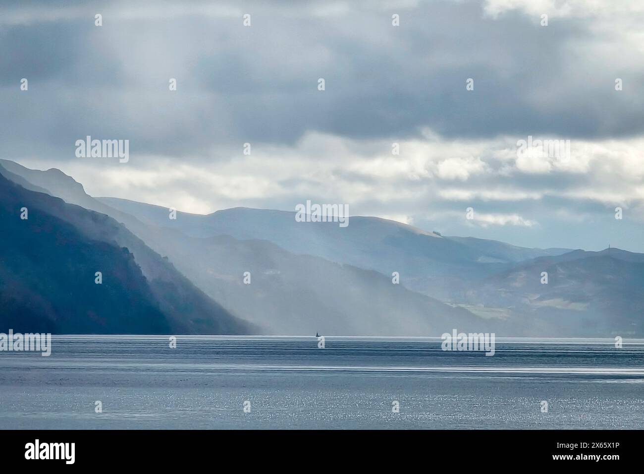 Sunrays and Clouds Above Loch Ness Stock Photo