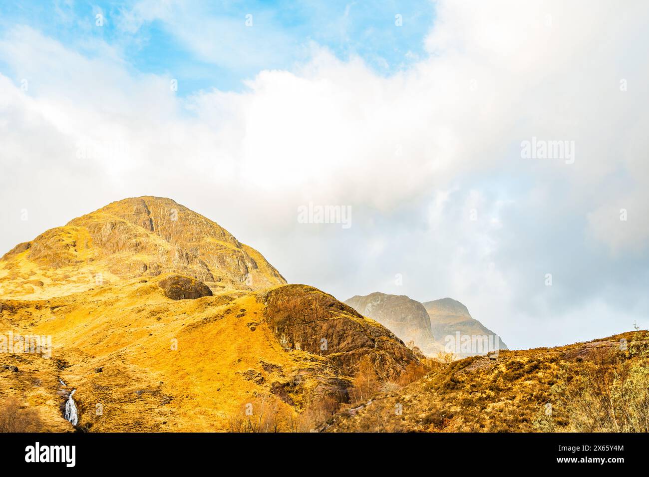 Golden Mountain Peaks Near Glencoe Stock Photo