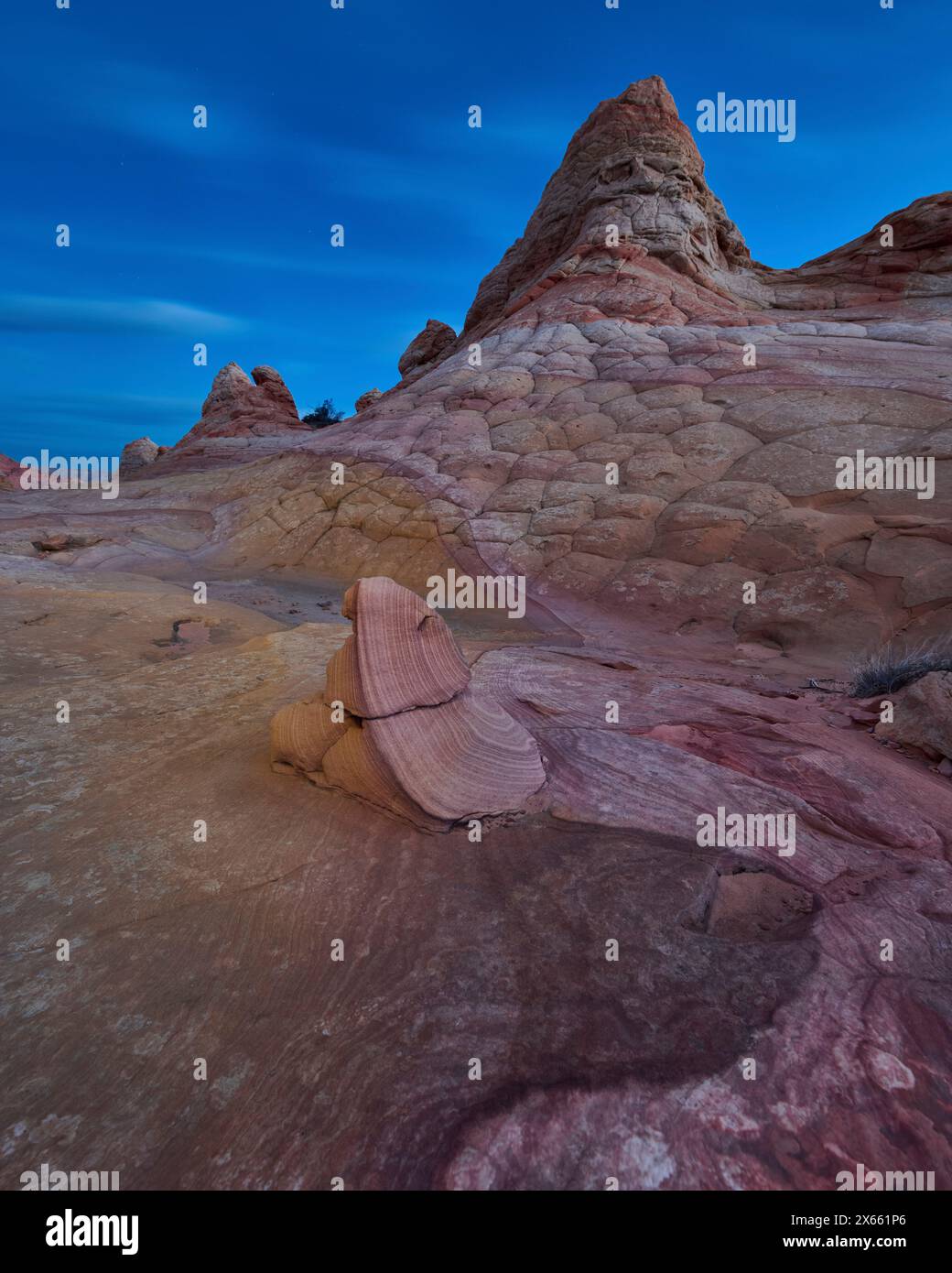 A rock has a swirled formation, a truly unique formation in the Stock Photo