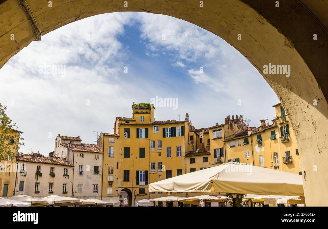 Entrance gate to the Anfiteatro square in Lucca, Italy Stock Photo