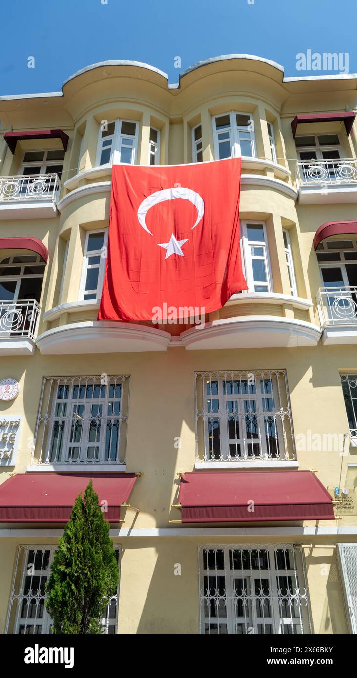 Turkish flag hanging on a building Stock Photo