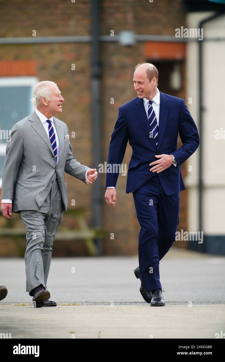 King Charles III and the Prince of Wales arrive for a visit to the Army Aviation Centre at Middle Wallop, Hampshire, for the King to officially hand over the role of Colonel-in-Chief of the Army Air Corps to William. Picture date: Monday May 13, 2024. Stock Photo