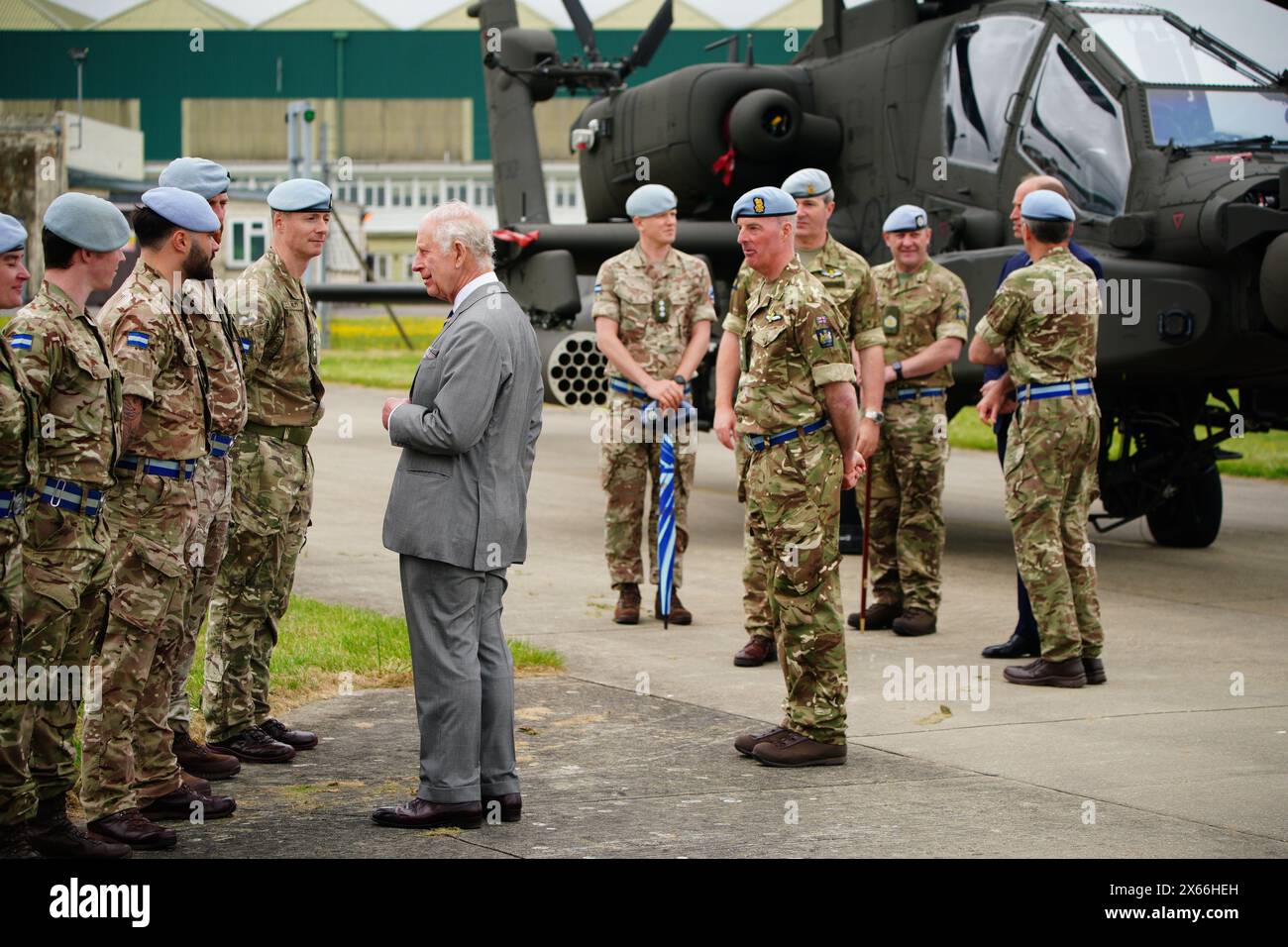 King Charles III meets members of the military during a visit to the Army Aviation Centre at Middle Wallop, Hampshire, for the King to officially hand over the role of Colonel-in-Chief of the Army Air Corps to the Prince of Wales. Picture date: Monday May 13, 2024. Stock Photo
