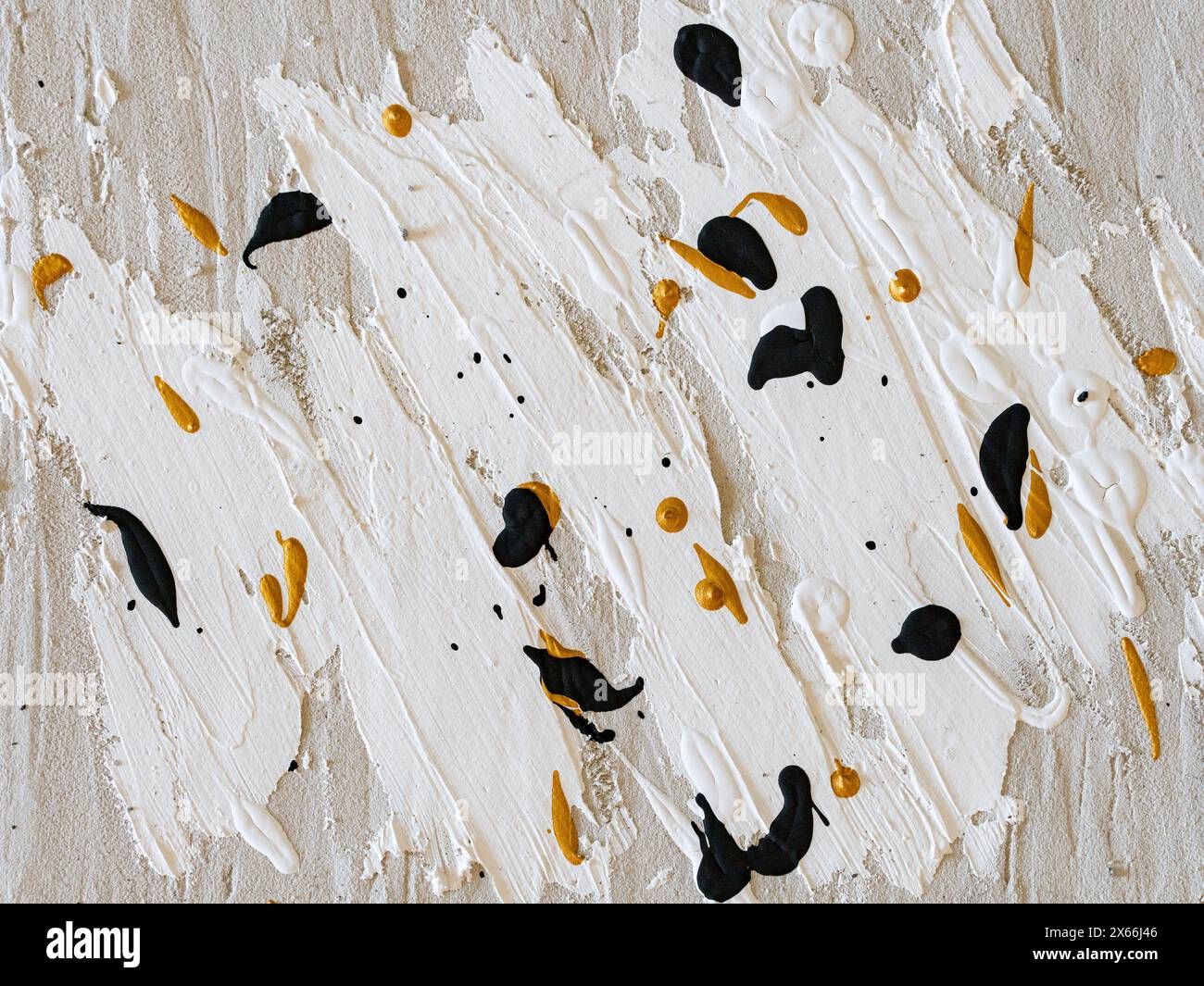 Painted background image with brush strokes and structure paste on a canvas. Random texture with black and golden spots. Abstract creative design. Stock Photo