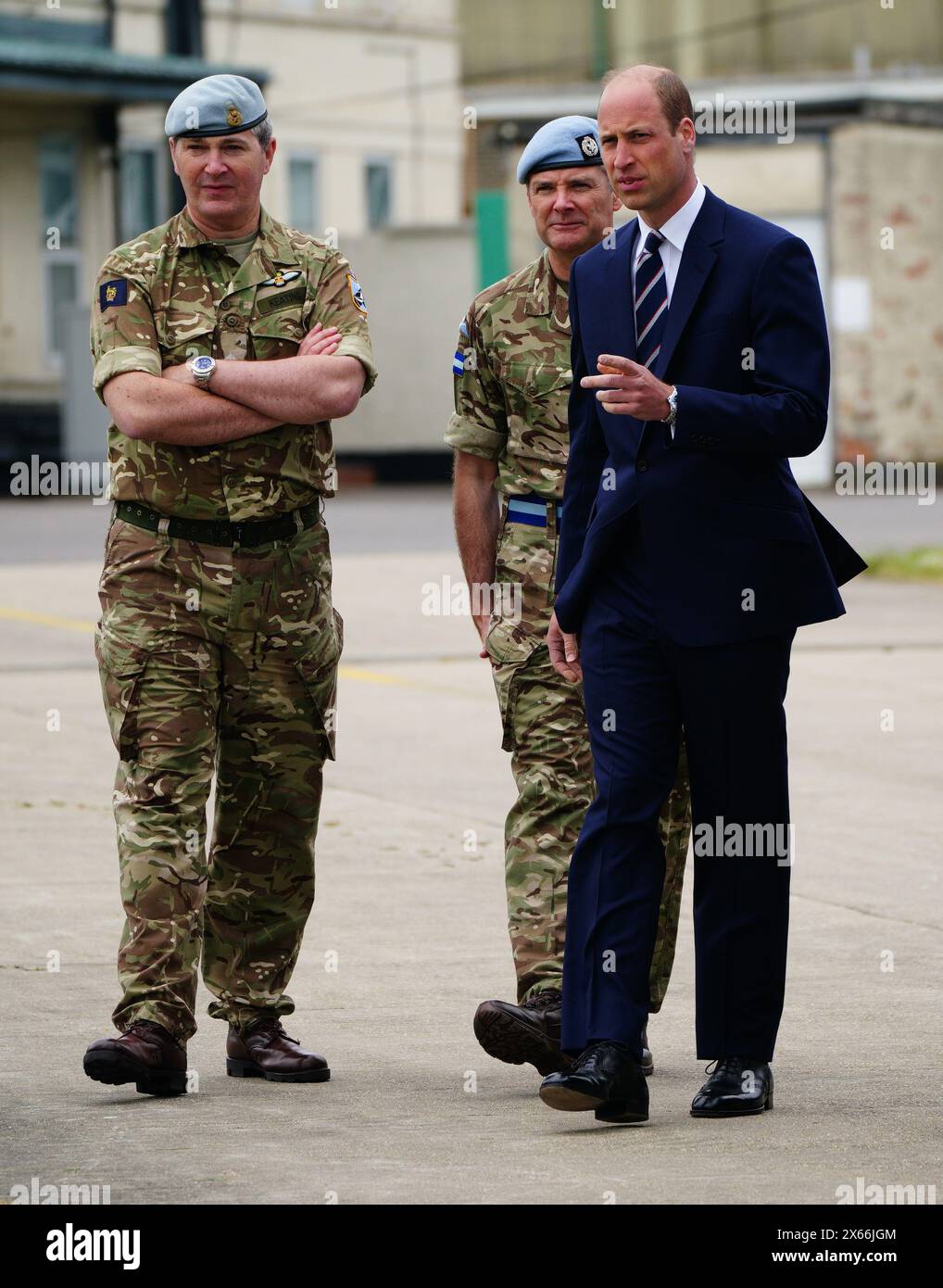 The Prince of Wales with members of the military during a visit to the Army Aviation Centre at Middle Wallop, Hampshire, for King Charles IIIto officially hand over the role of Colonel-in-Chief of the Army Air Corps to Prince William. Picture date: Monday May 13, 2024. Stock Photo