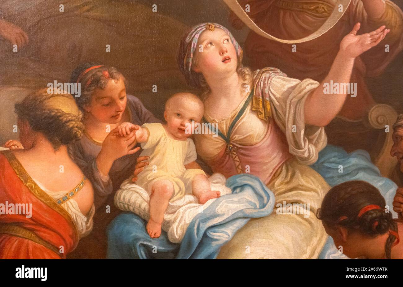 Detail of vintage italian painting showing medieval women taking care of a baby Stock Photo