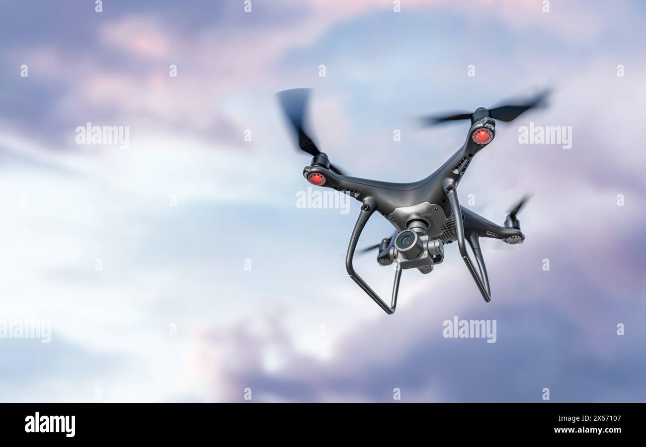 Black drone quadcopter flies hi-res stock photography and images - Alamy