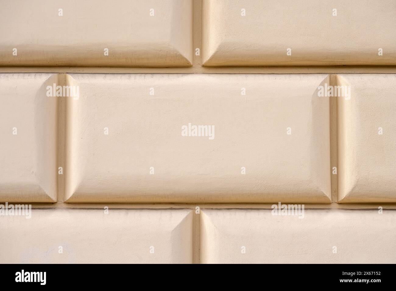 Background from a beige wall with rectangle shapes Stock Photo