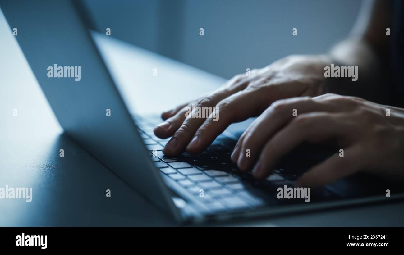 Close-up Static Shot: Person Typing on the Laptop Keyboard. Working, Writing Emails, Using Internet, Doing Coding, Programming Software, Developing e-Commerce Project or e-Business Customer Service Stock Photo