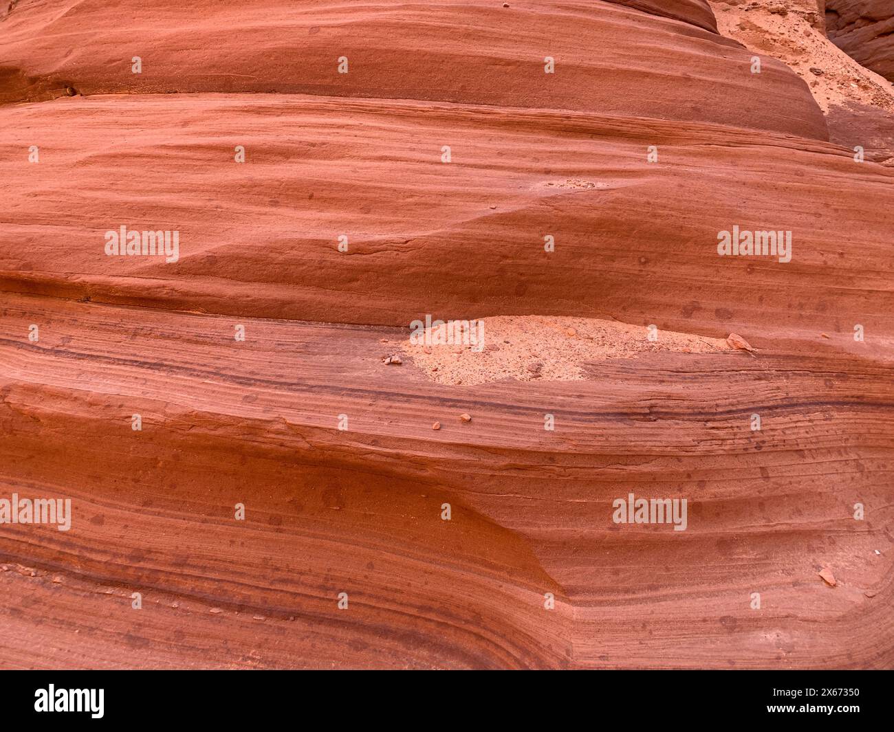 Close up of sandstone walls in Antelope Canyon show the eroded ...