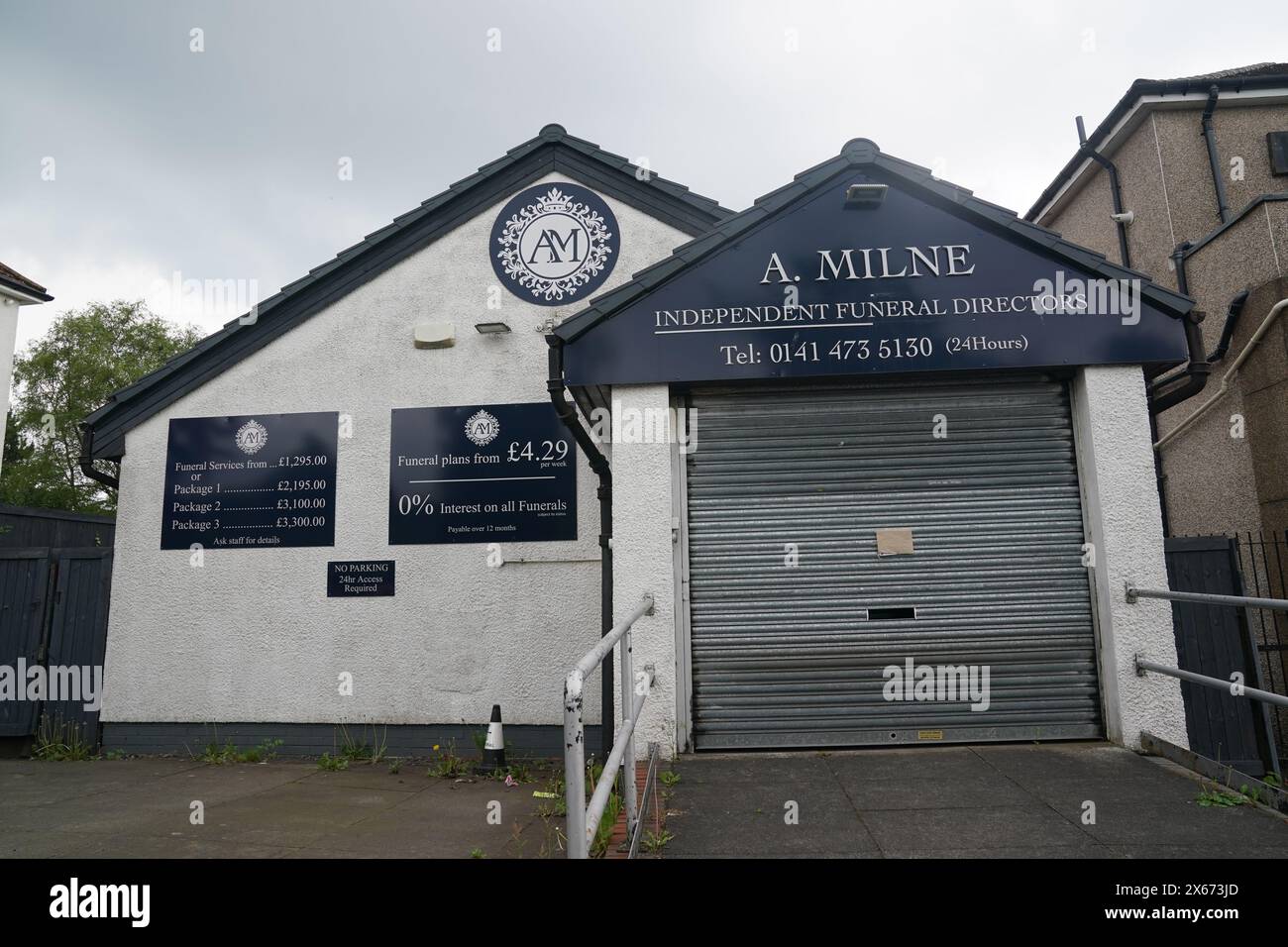 A general view of A. Milne funeral directors in Balornock, Glasgow. An investigation is ongoing into to the conduct of a former funeral company that had branches in Glasgow and Dumbarton with regard to the storage/return of cremated remains and allegations of financial misconduct. Picture date: Monday May 13, 2024. Stock Photo