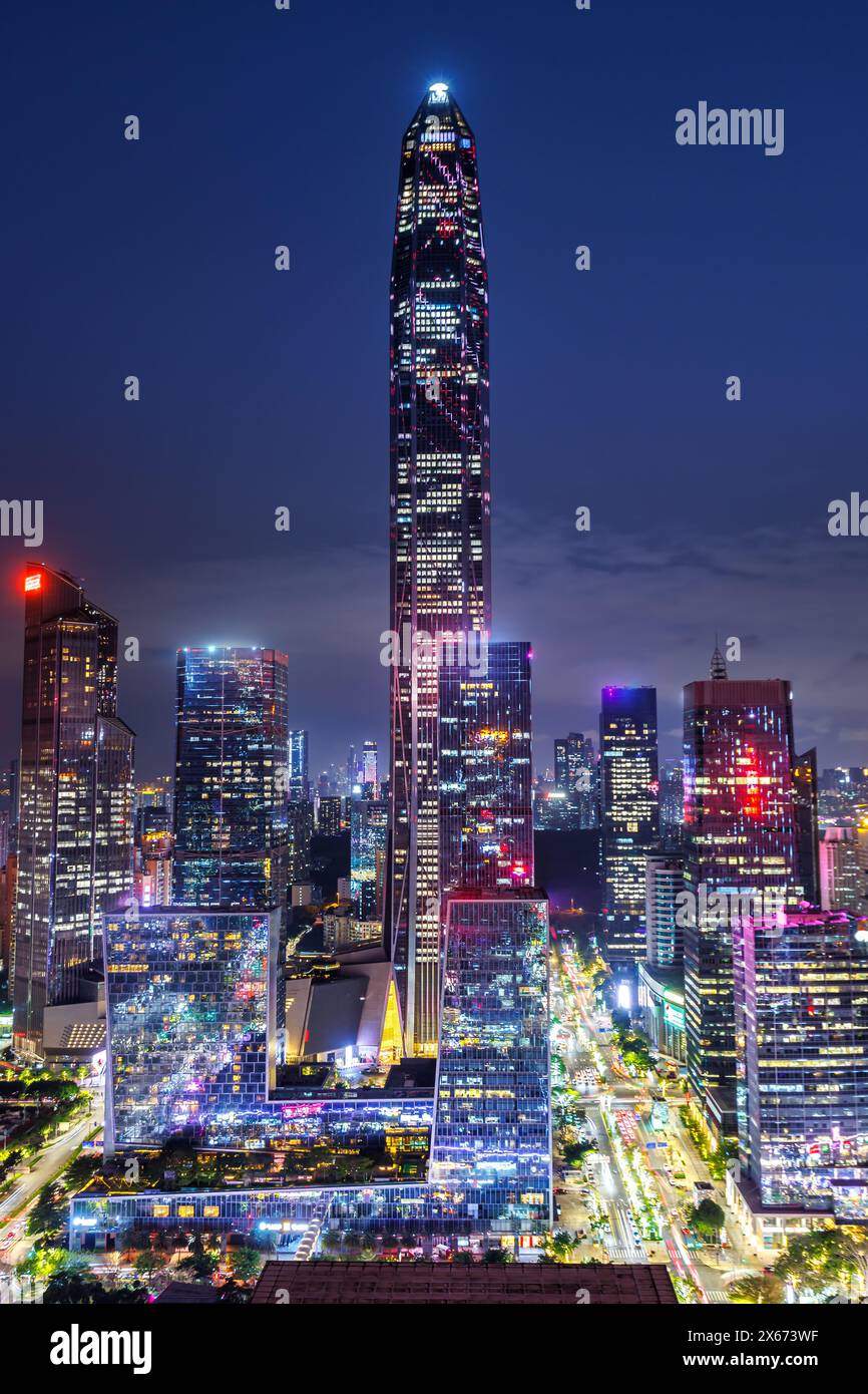 Shenzhen skyline cityscape with skyscrapers in downtown city portrait format at night in Shenzhen, China Stock Photo