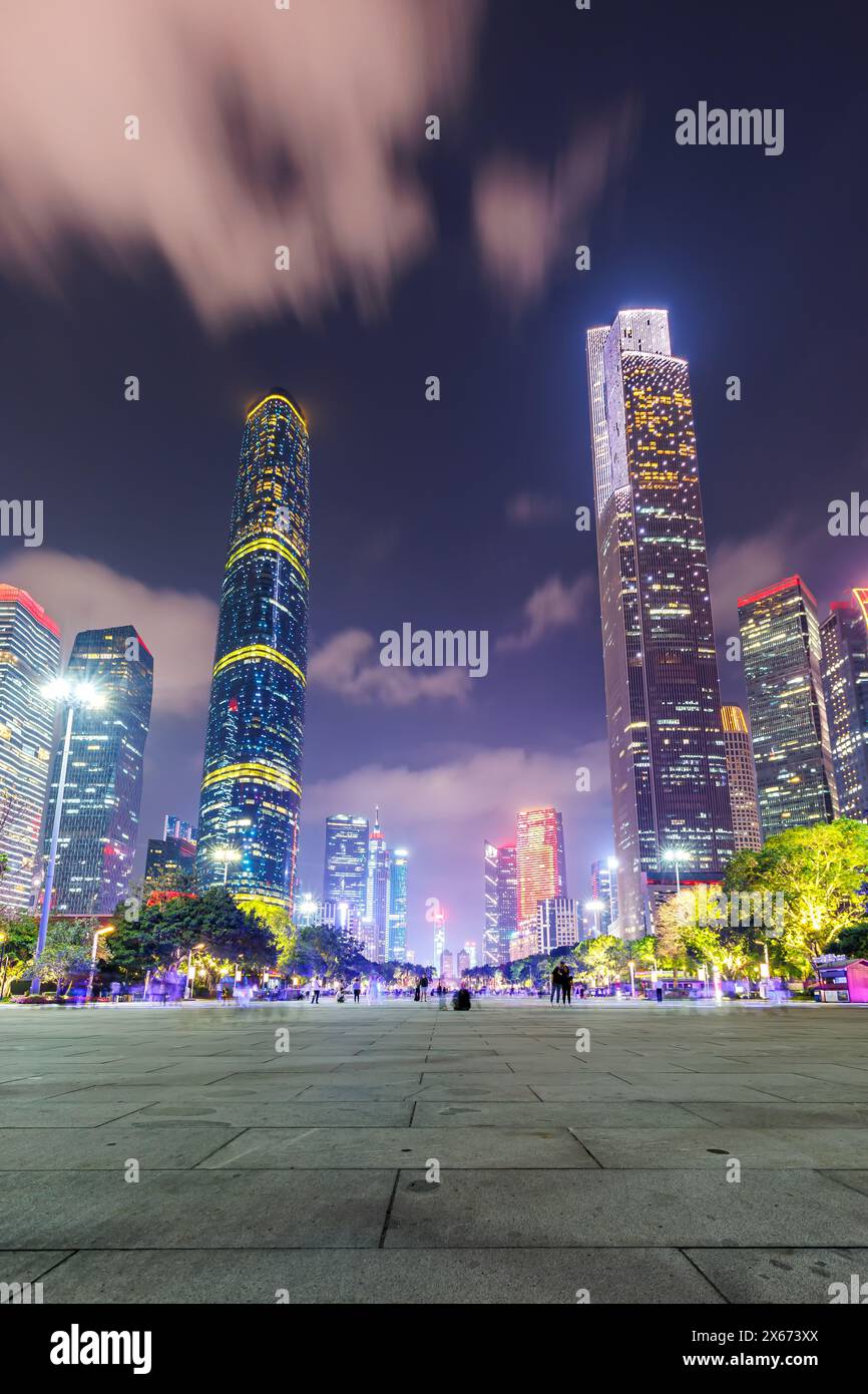 Guangzhou Canton skyline cityscape with skyscrapers buildings in downtown at night portrait format in Guangzhou, China Stock Photo