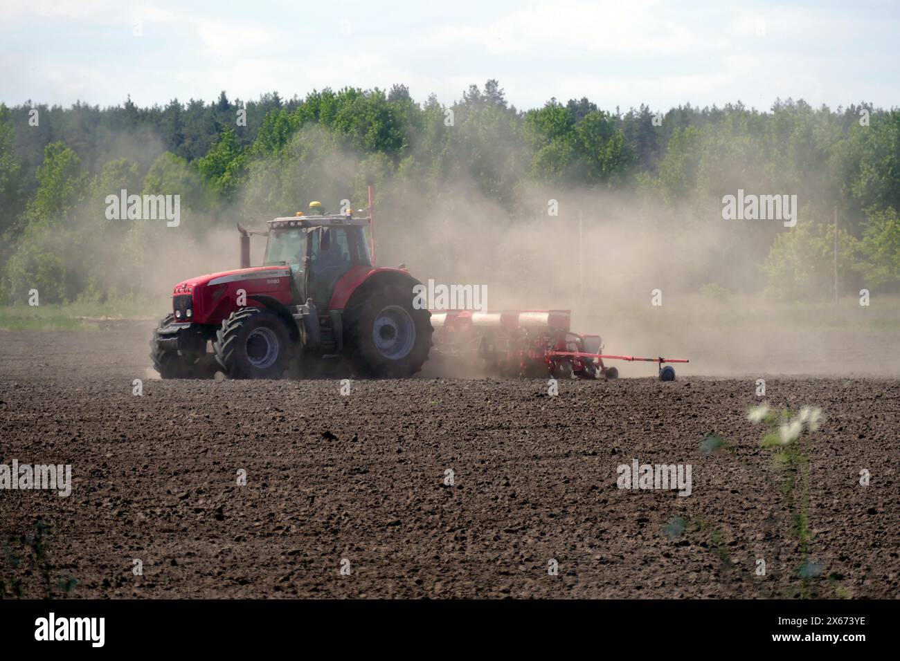 CHERKASY REGION, UKRAINE - MAY 09, 2024 - Tractor is seen in the field ...