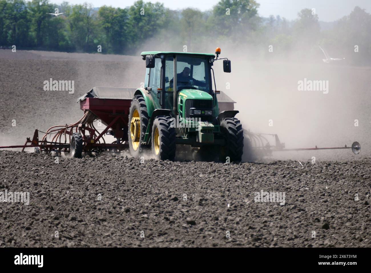 CHERKASY REGION, UKRAINE - MAY 09, 2024 - Tractor is seen in the field ...