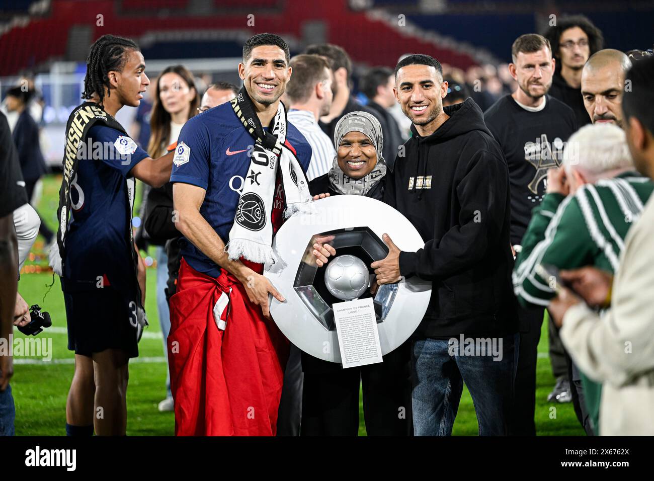 Paris, France. 12th May, 2024. Achraf Hakimi his brother Nabil and his mother Saida Mouth during