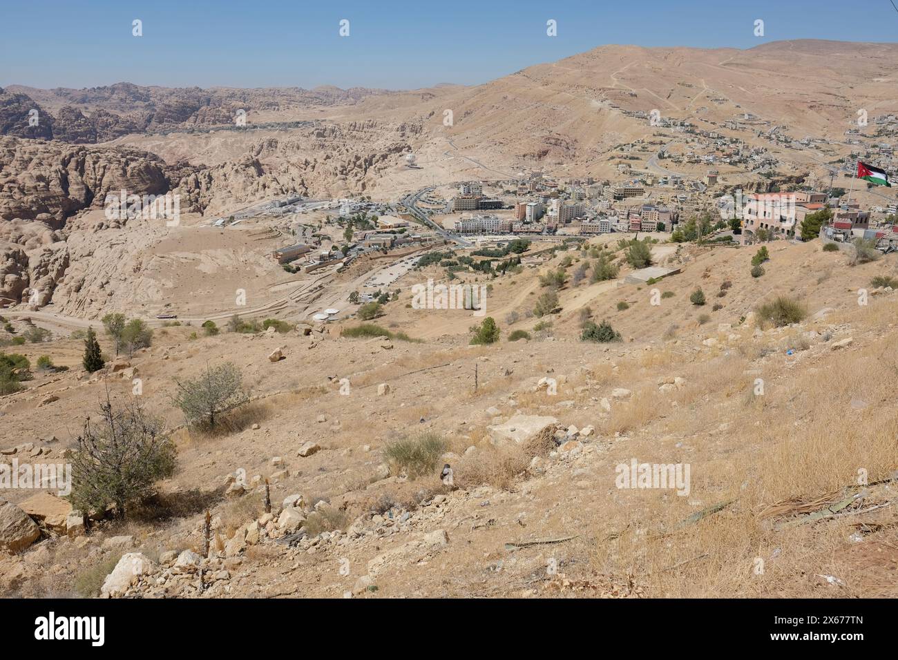 Wadi Musa gateway town to the ancient city of Petra in Jordan among the Jordanian desert - photo August 2023 Stock Photo