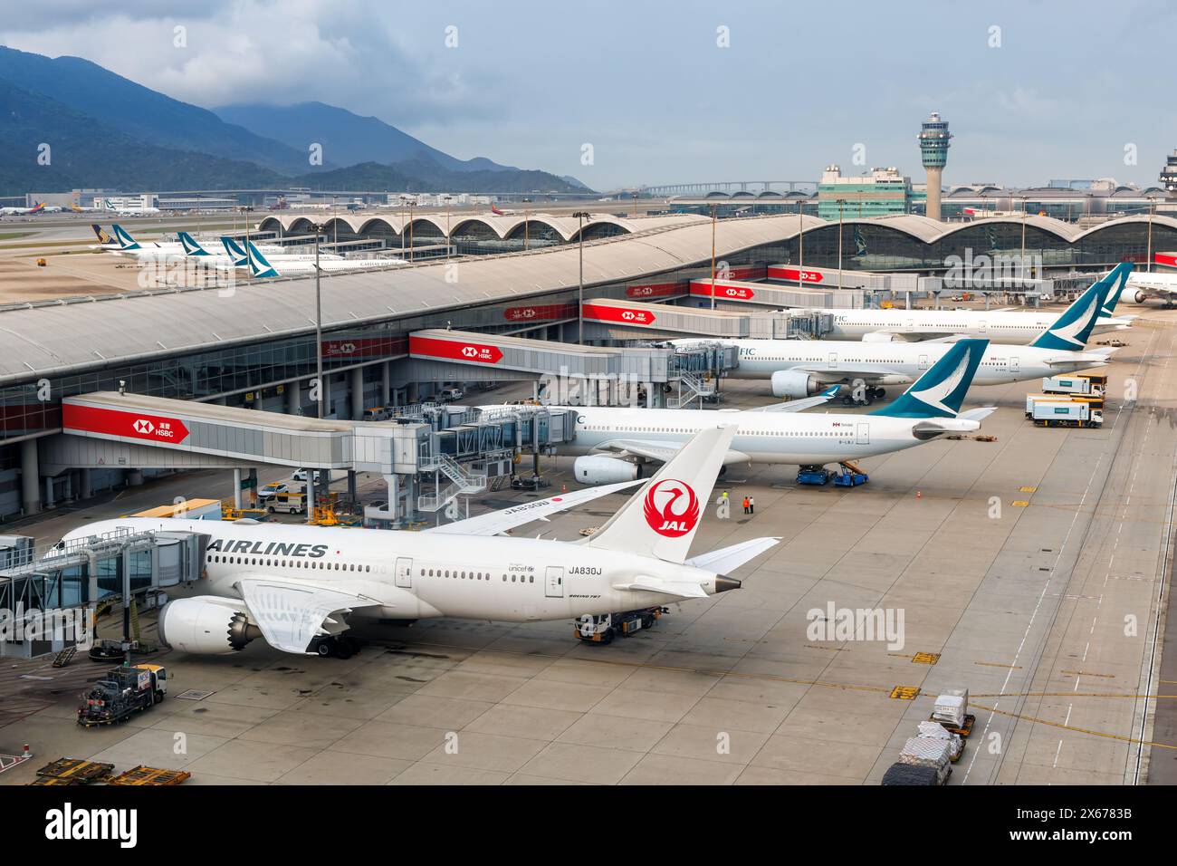 Hong Kong, China - April 7, 2024: Airplanes at Hong Kong Chek Lap Kok Airport in China. Stock Photo