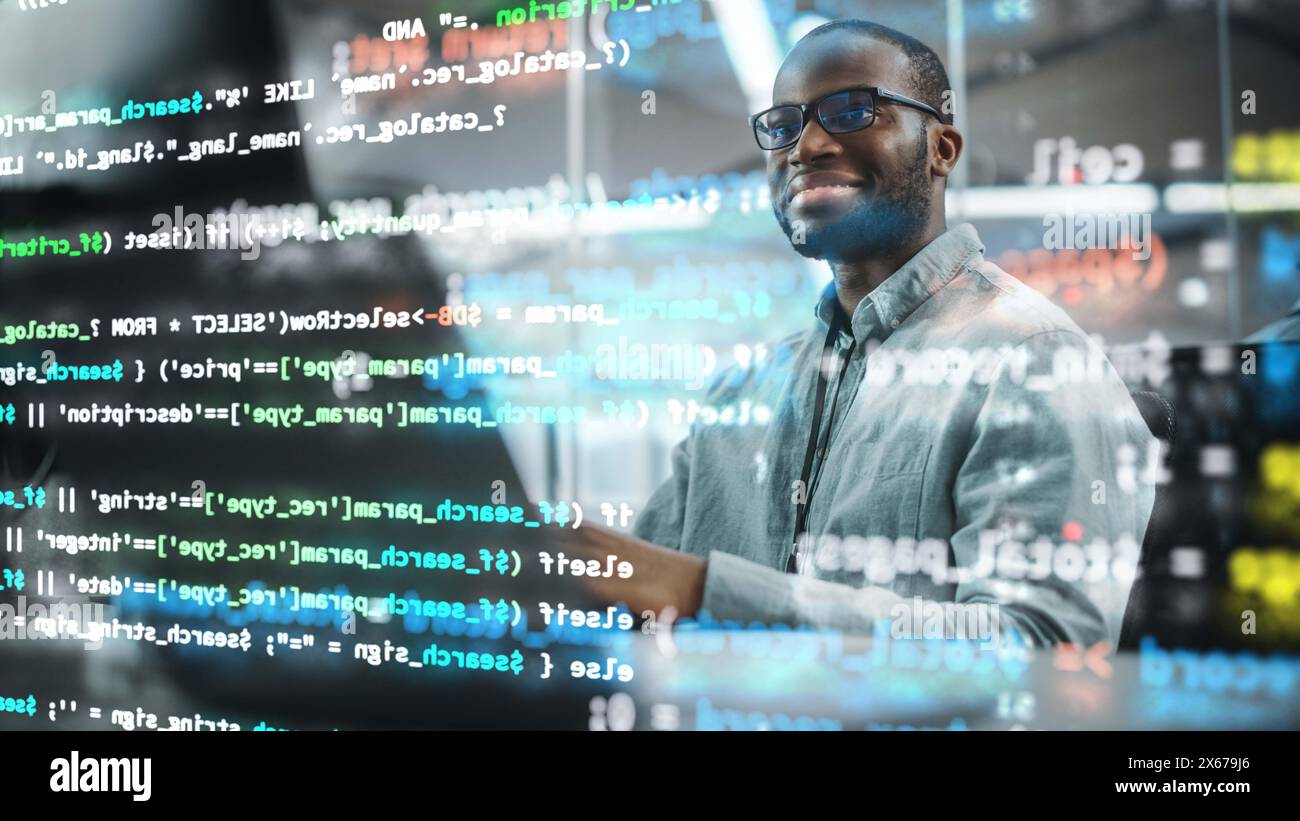 Real Office: Professional Black IT Programmer Working on Desktop Computer. Male Website Developer and Software Engineer Developing App, Video Game. Shot with Visual Effects of Running Code. Stock Photo