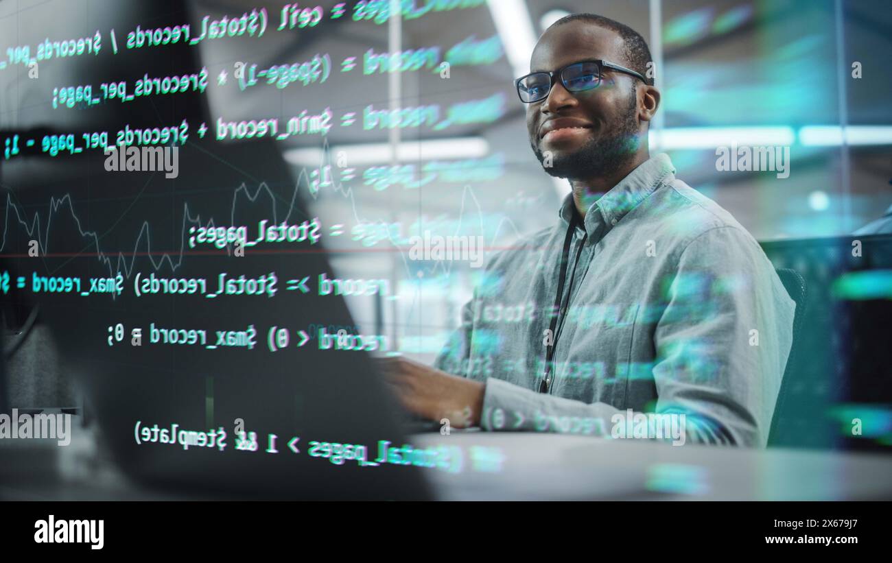 Real Office: Professional Black IT Programmer Working on Desktop Computer. Male Website Developer and Software Engineer Developing App, Video Game. Shot with Visual Effects of Running Code. Stock Photo
