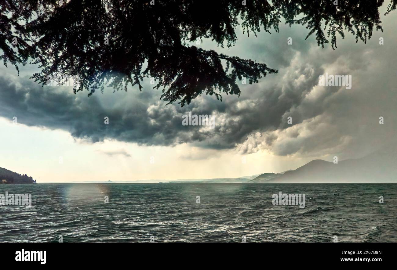 Approaching Thunderstorm Clouds Over Lake Garda in Italy Stock Photo