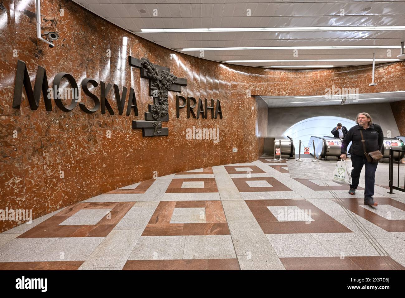 FILE PHOTO Bronze sculpture with the inscription Moscow-Prague in the lobby of the Andel metro station (originally Moskevska, until 1990), in Prague, Czech Republic, May 6, 2024. The Prague City Hall will add an explanatory plate to the bronze sculpture with the inscription Moscow-Prague from the communist era in the lobby of the Andel metro station on line B, according to a document that the Prague Council approved today on 13 May 2024. The plate will state that former Czechoslovakia was then occupied by the Soviet Union, and friendship between the two countries was only a propaganda claim. ( Stock Photo