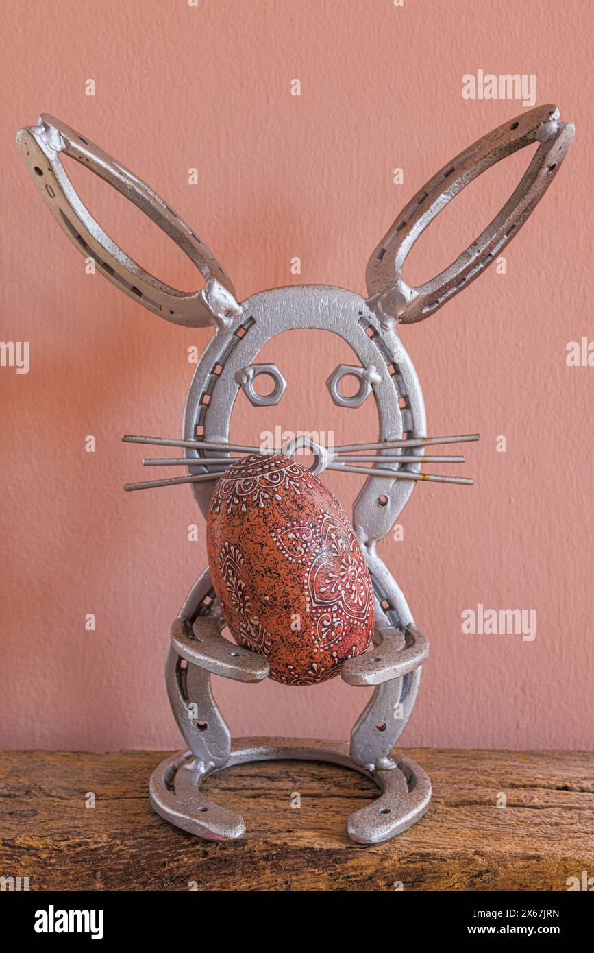 Easter motif, rabbit figure made of horseshoe Stock Photo - Alamy