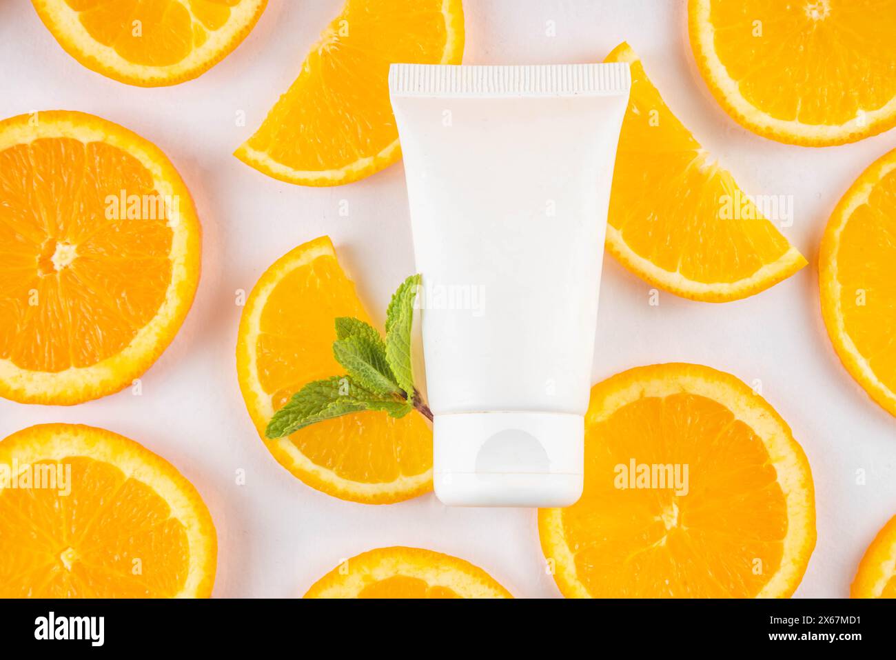 Orange citrus Vitamin C face care - cream, serum. mask, face cleaner, antioxidant moisturizer skin face care and make up concept, with fresh orange fr Stock Photo