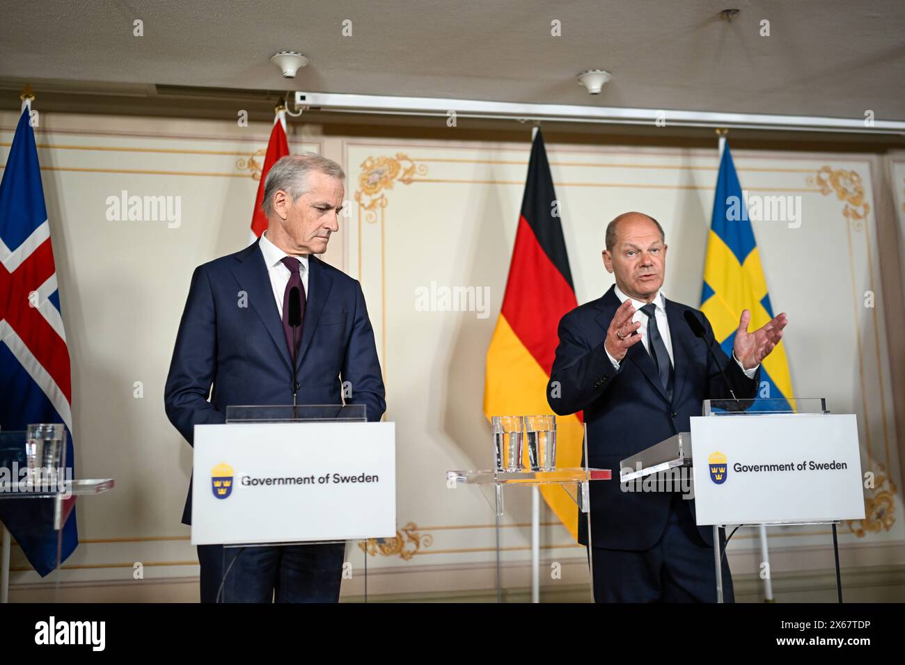 Stockholm, Sweden. 13th May, 2024. STOCKHOLM, SWEDEN 20240513Norway's Prime Minister Jonas Gahr Støre (L) and Germany's Chancellor Olaf Scholz hold a joint news conference with the other Nordic Prime Ministers at Skeppsholmen in Stockholm, Sweden, May 13, 2024, during a two-day Nordic Prime Minister's meeting, on security and competitiveness. Photo: Pontus Lundahl/TT/Code 10050 Credit: TT News Agency/Alamy Live News Stock Photo