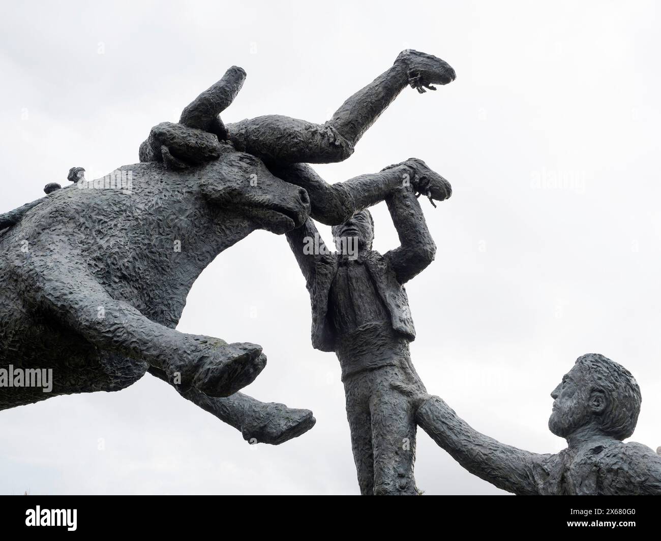 Angra do Heroismo, animal cruelty, art, Azores, bull fight, bull flight statue outside bull ring, man and animal, play, Portugal, sculpture, Sport utility vehicle, Terceira, traditions Stock Photo