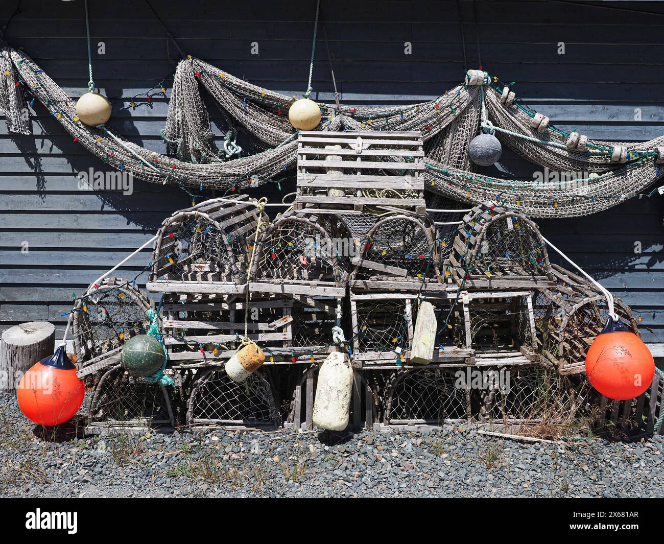 Atlantic Ocean, balance, buoys, Canada, colour contrast, fishing nets, gray, lobster pots, Maddox Cove, monotone, Newfoundland, North America, Petty Harbour, photographic still life, fishing nets, red buoys, sunshine Stock Photo