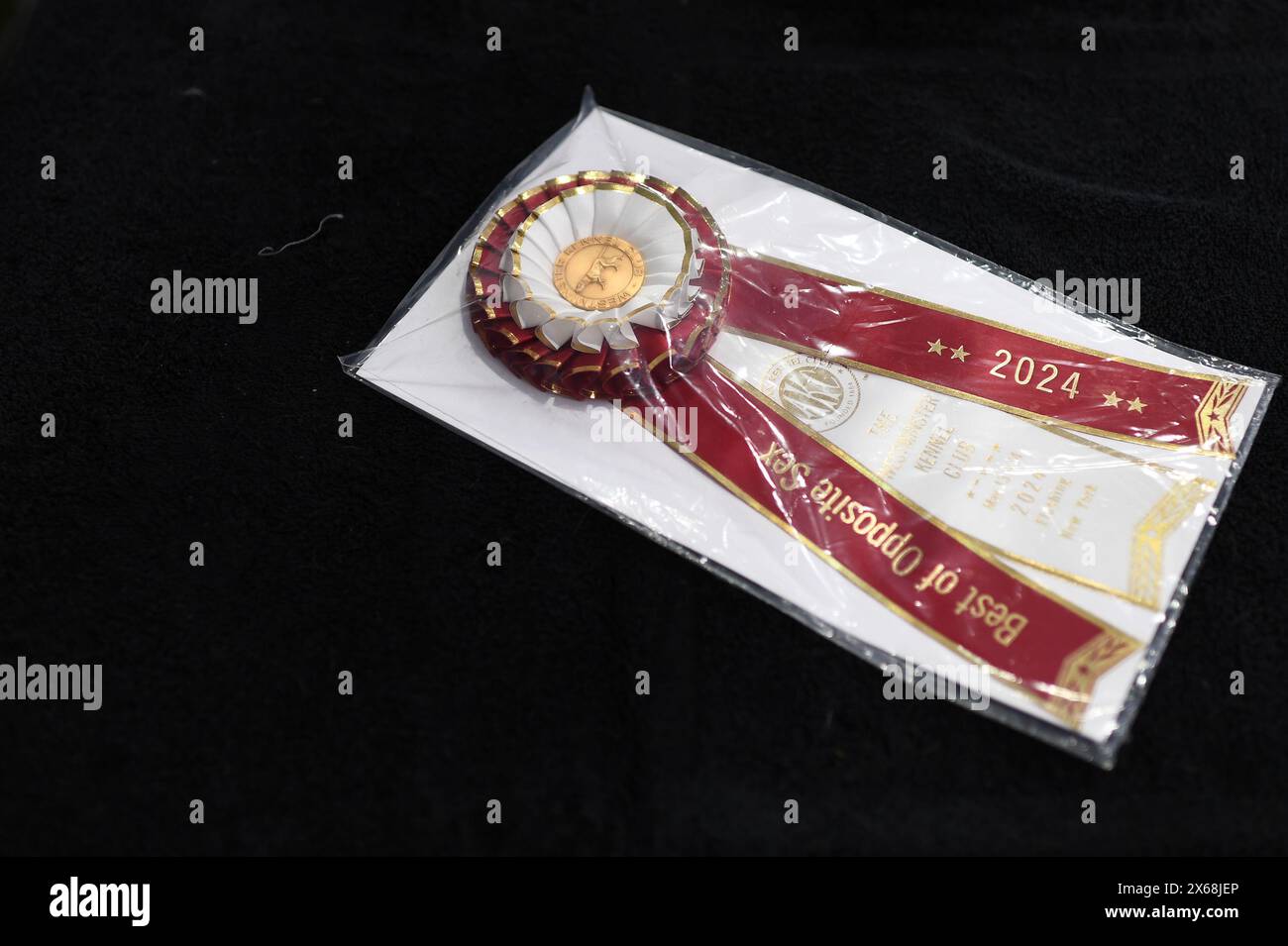 New York, USA. 13th May, 2024. A competition ribbon rests on a table during day 1 of the 148th Westminster Kennel Club Dog show, at the USTA Billie Jean King National Tennis Center, Flushing Meadows Corona Park(, Queens, NY, May 13, 2024. (Photo by Anthony Behar/Sipa USA) Credit: Sipa USA/Alamy Live News Stock Photo