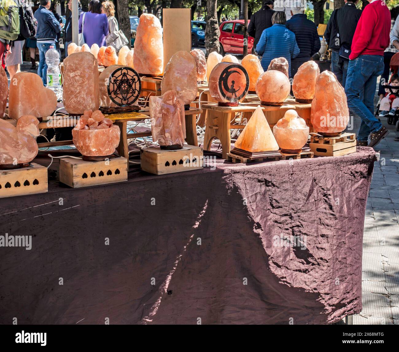 Outdoor Market Stall Displaying an Array of Himalayan Salt Lamps in Trani, Italy Stock Photo