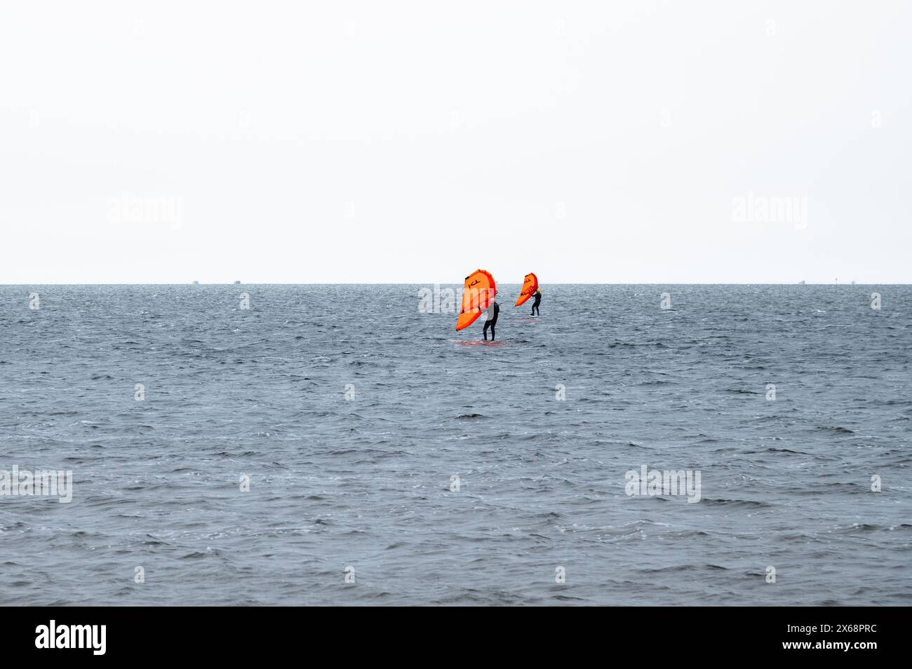 Two windsurfers in  Pamlico Sound, Outer Banks, North Carolina Stock Photo
