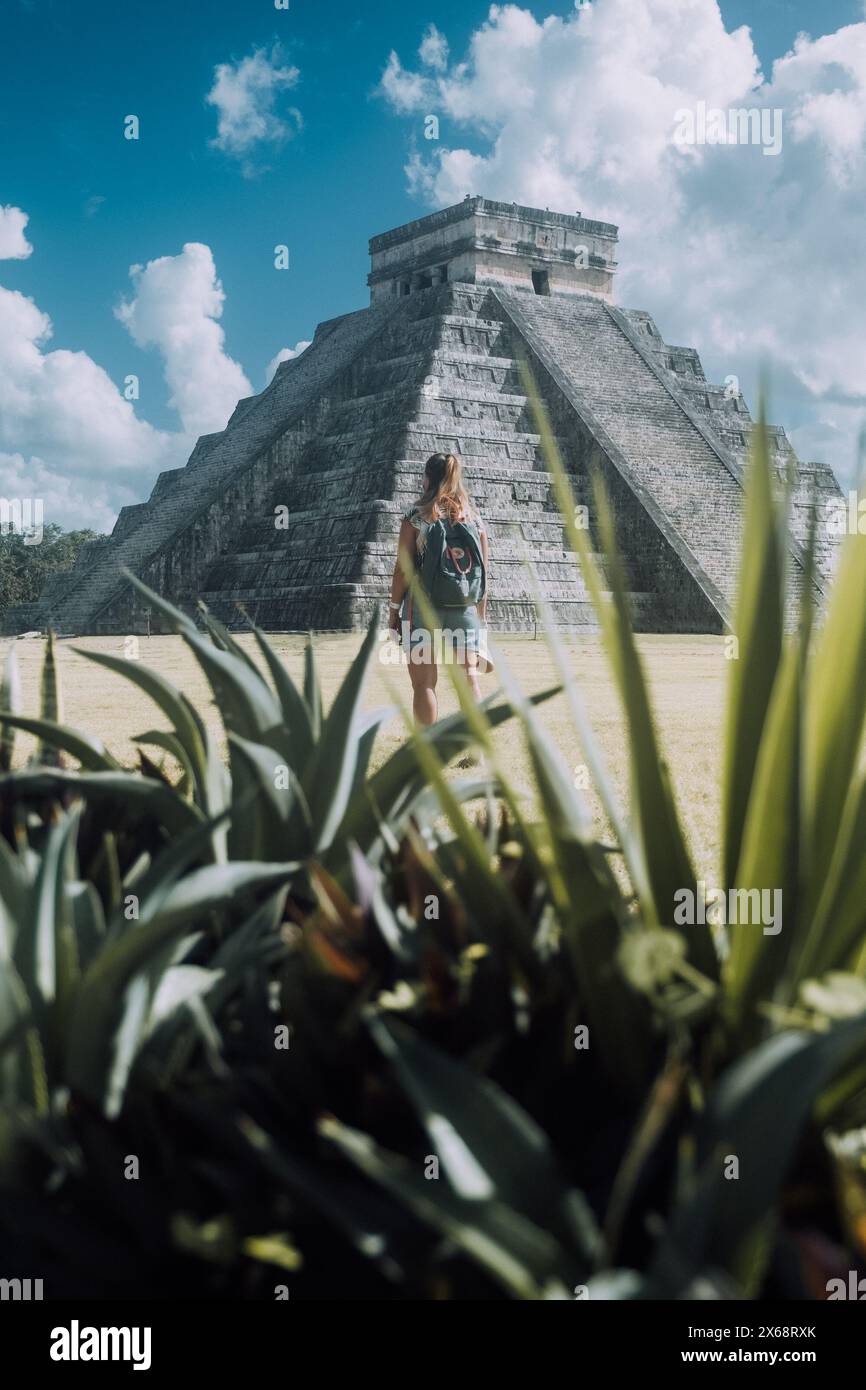 Woman touring El Castillo pyramid at Chichen Itza, Tulum Stock Photo ...