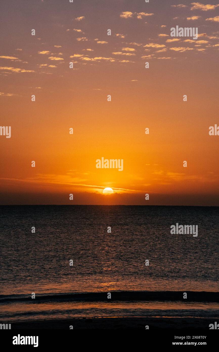 Sunrise over ocean scattered hi-res stock photography and images - Alamy