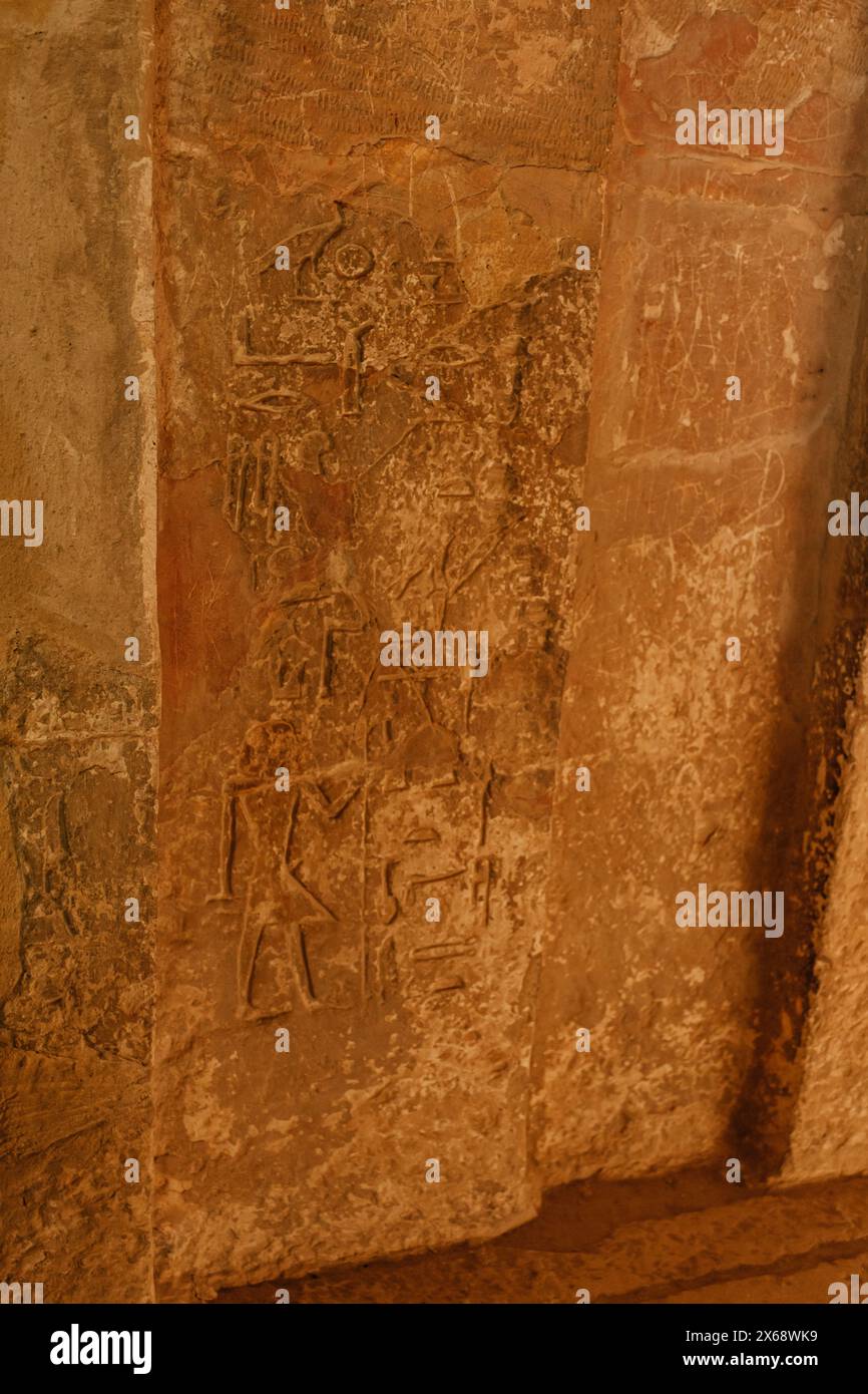 Ancient Egyptian hieroglyphs carved on Giza stone wall Stock Photo - Alamy