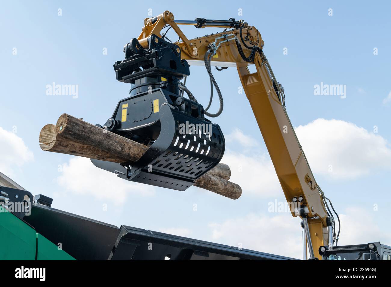 Loading of timber. Loader close up. Stock Photo