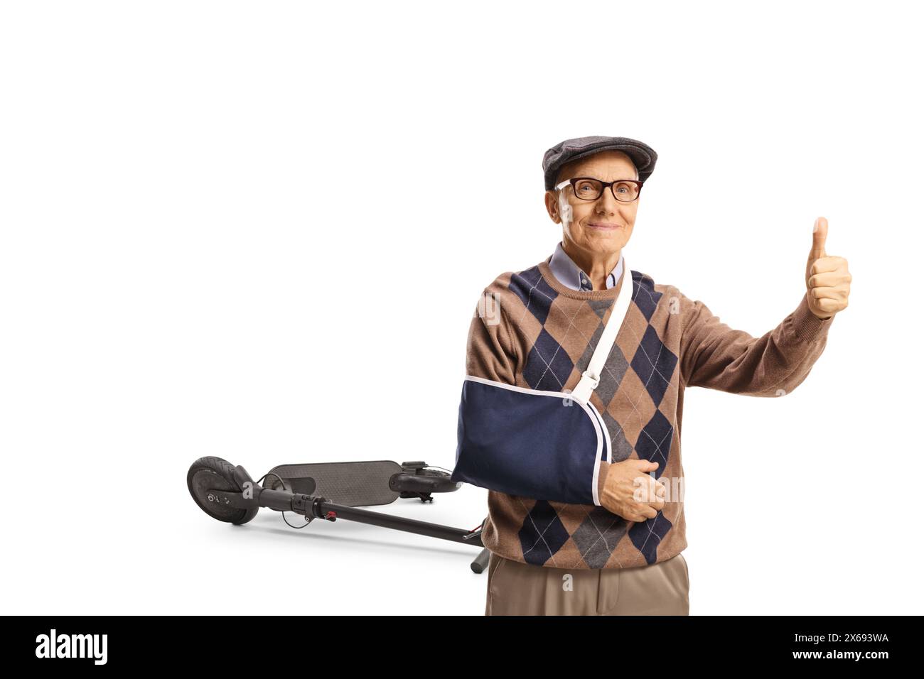 Elderly man with a broken arm gesturing thumbs up isolated on white background, electric scooter accident concept Stock Photo