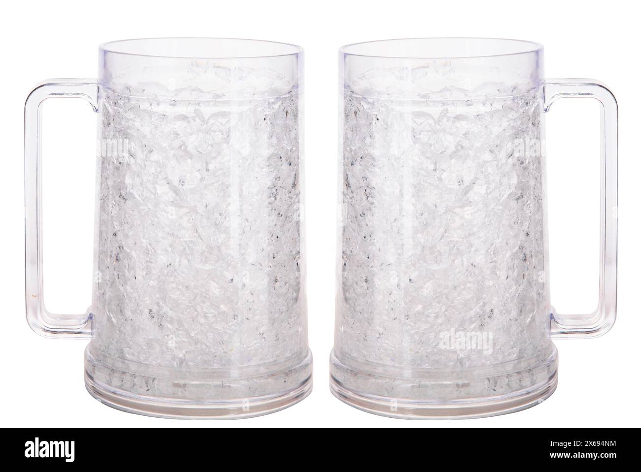 Two empty beer mugs with ergonomic handle isolated on white background with copy space Stock Photo