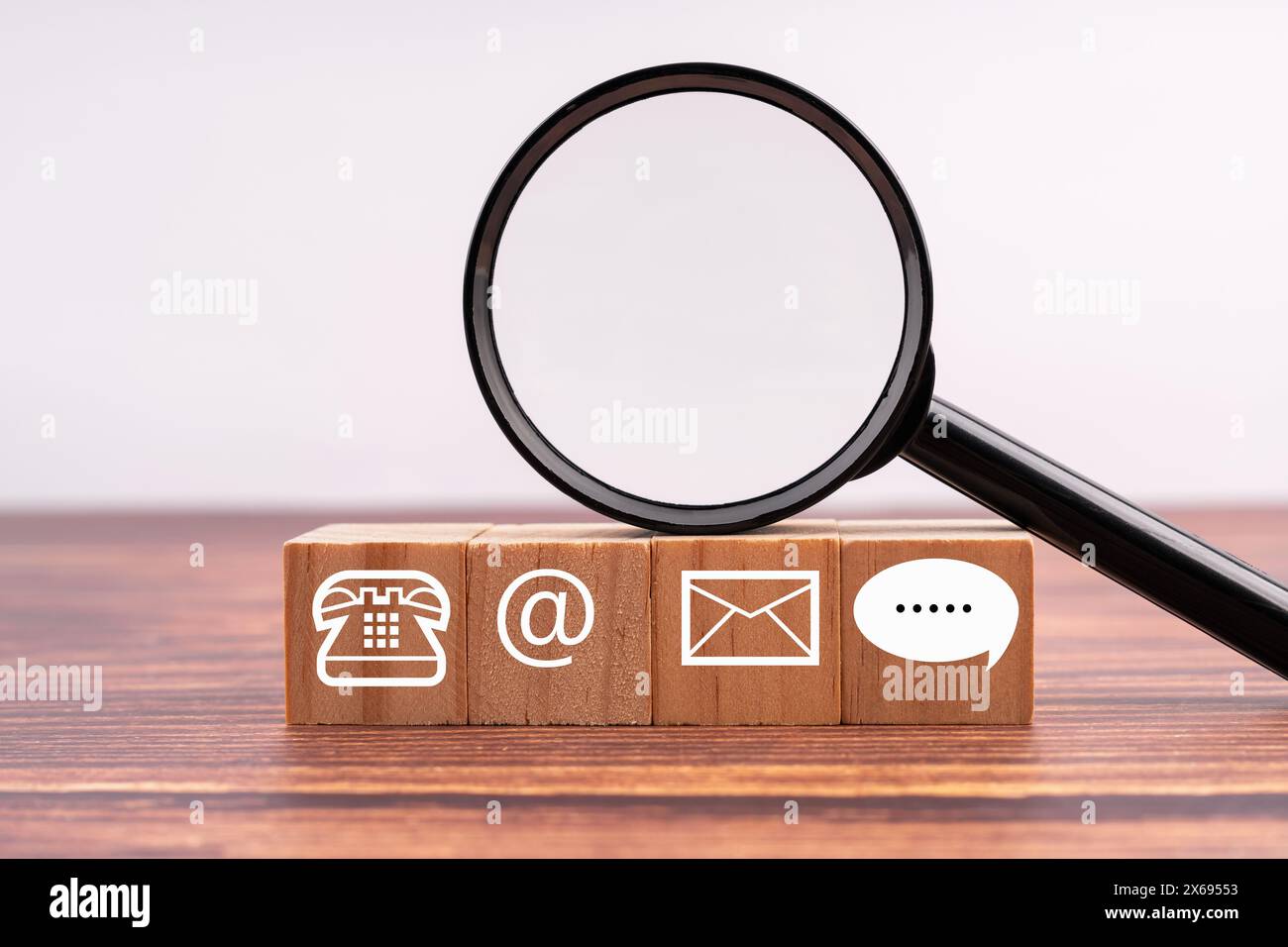 Contact Us symbol and magnifying glass business concept Stock Photo