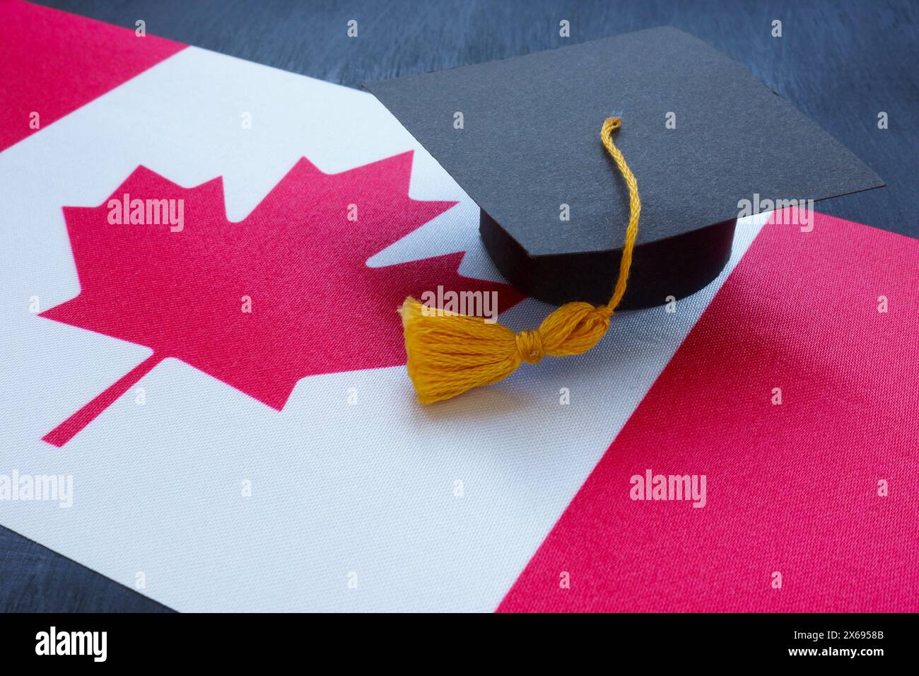 Canada flag and graduation cap on it Stock Photo - Alamy