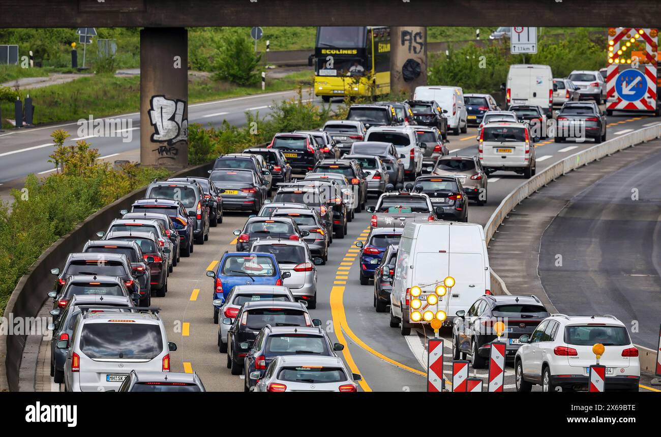 Duisburg, North Rhine-Westphalia, Germany - Traffic jam on the A40 freeway at the Kaiserberg junction. The busy area with the A40 and A3 freeways is being renovated and expanded for years. There are always closures or restrictions for motorists. Stock Photo