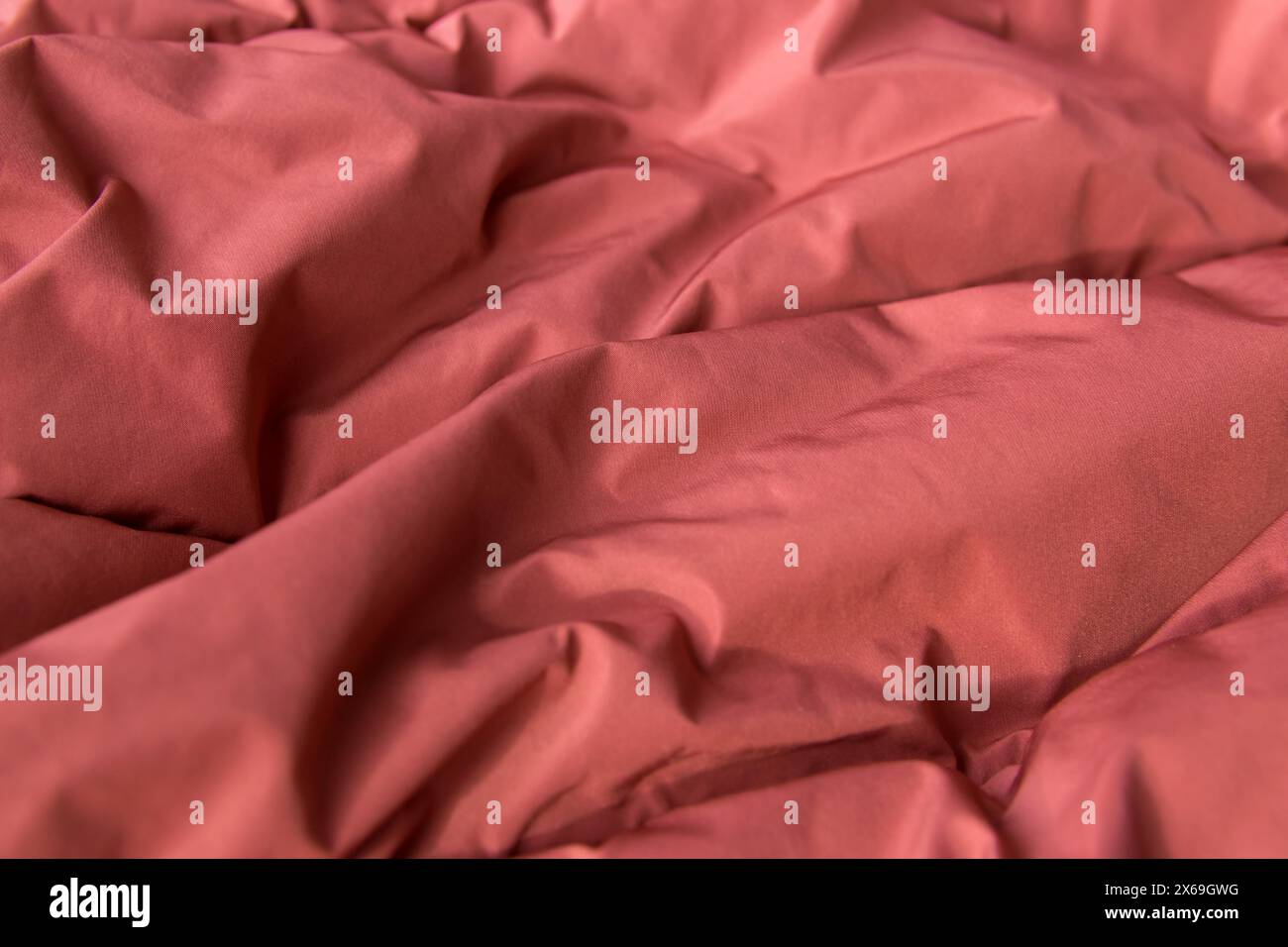 Texture fabric. Textile brown knitted cloth background. Stock Photo